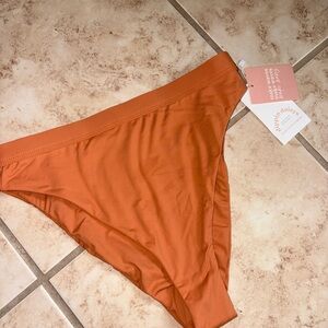 Dippin' Daisy's Vibrant Orange Bikini Bottom